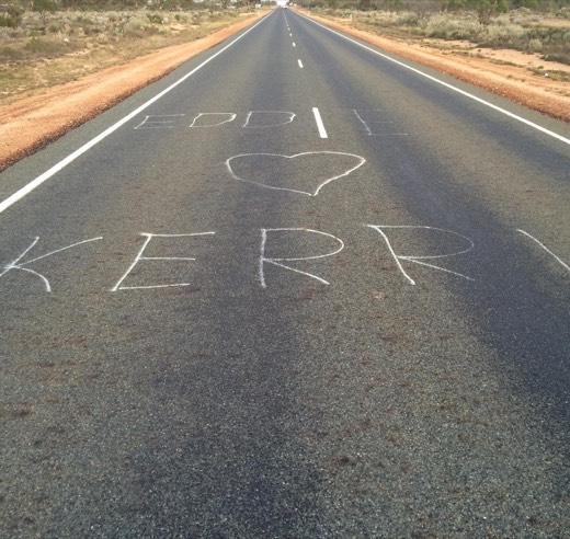 Retrospective Day 27 photo of a chalk road message reading Eddie loves Kerri.