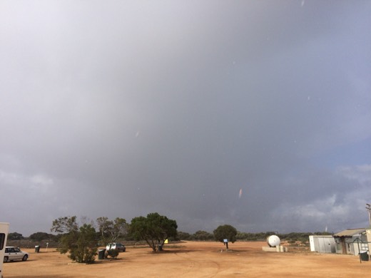 Dark storm clouds over Cocklebiddy