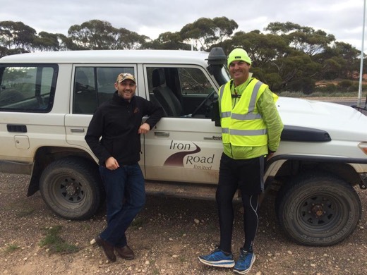 Gary with Joel Howard beside an Iron Road vehicle during Day 53