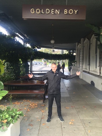 Ben standing outside Golden Boy in Adelaide after his Torrens parkrun PB