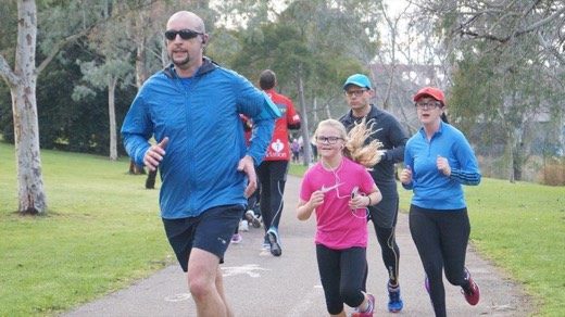 A runner in blue at Torrens parkrun during the Adelaide rest day.