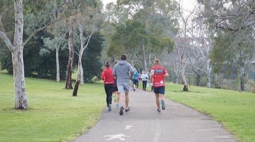 Runners on the Torrens parkrun path during the Adelaide rest day.