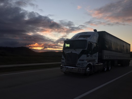 A truck on the Hume Highway at sunset near the Day 94 overnight stop.