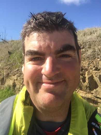 Gary taking a late-morning selfie beside the road on Day 95.