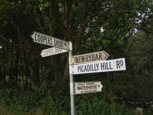 Road signs at Cooper's Shoot Road, Picadilly Hill Road and Old Newrybar Road.