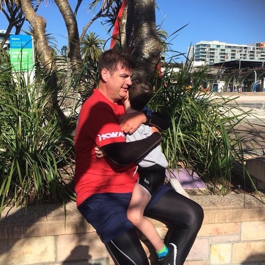 Gary hugging his son after the final South Bank parkrun.