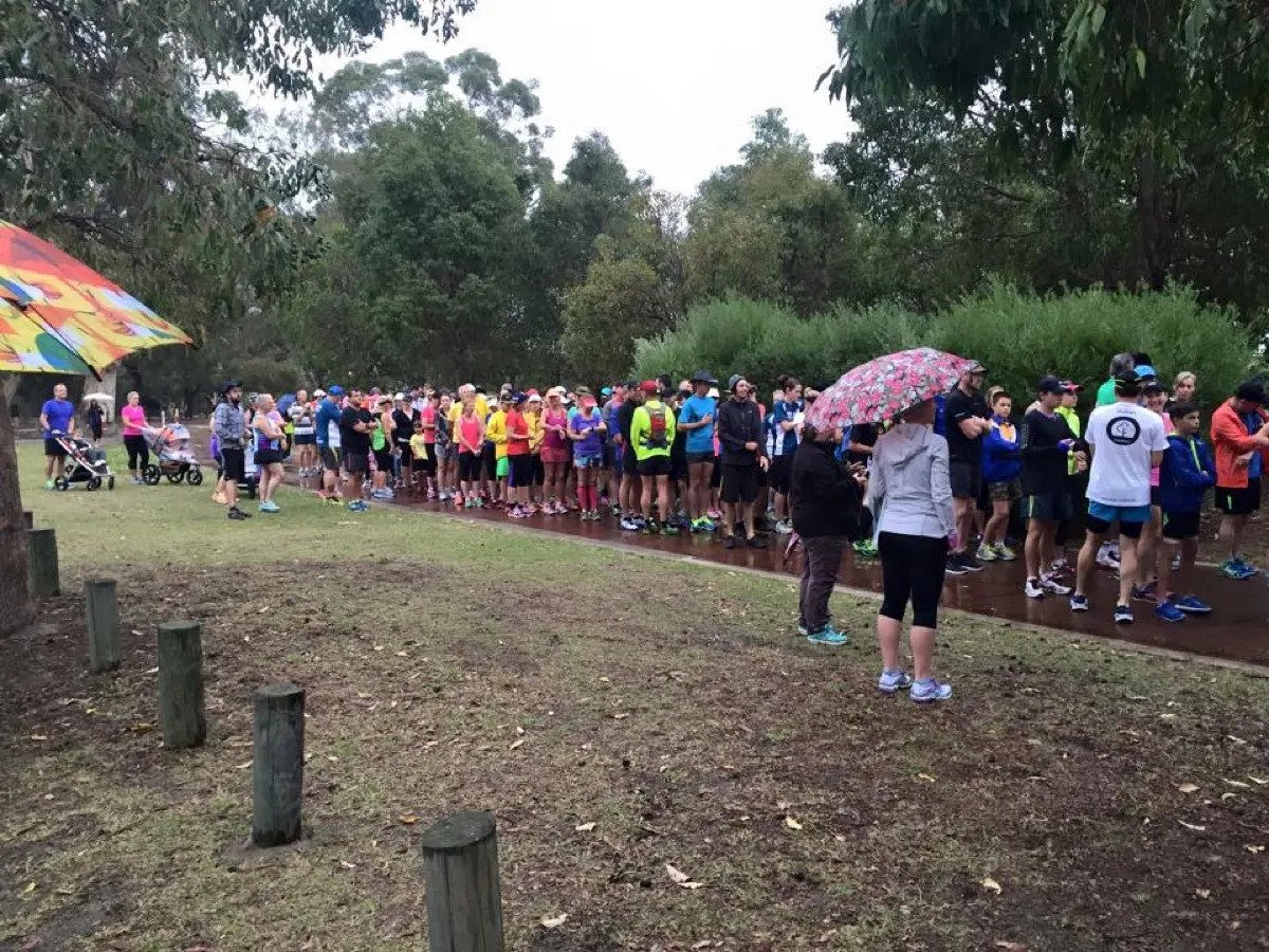 Friends, supporters, and media gathered in wet conditions at Canning River parkrun before Hearts Across Australia began